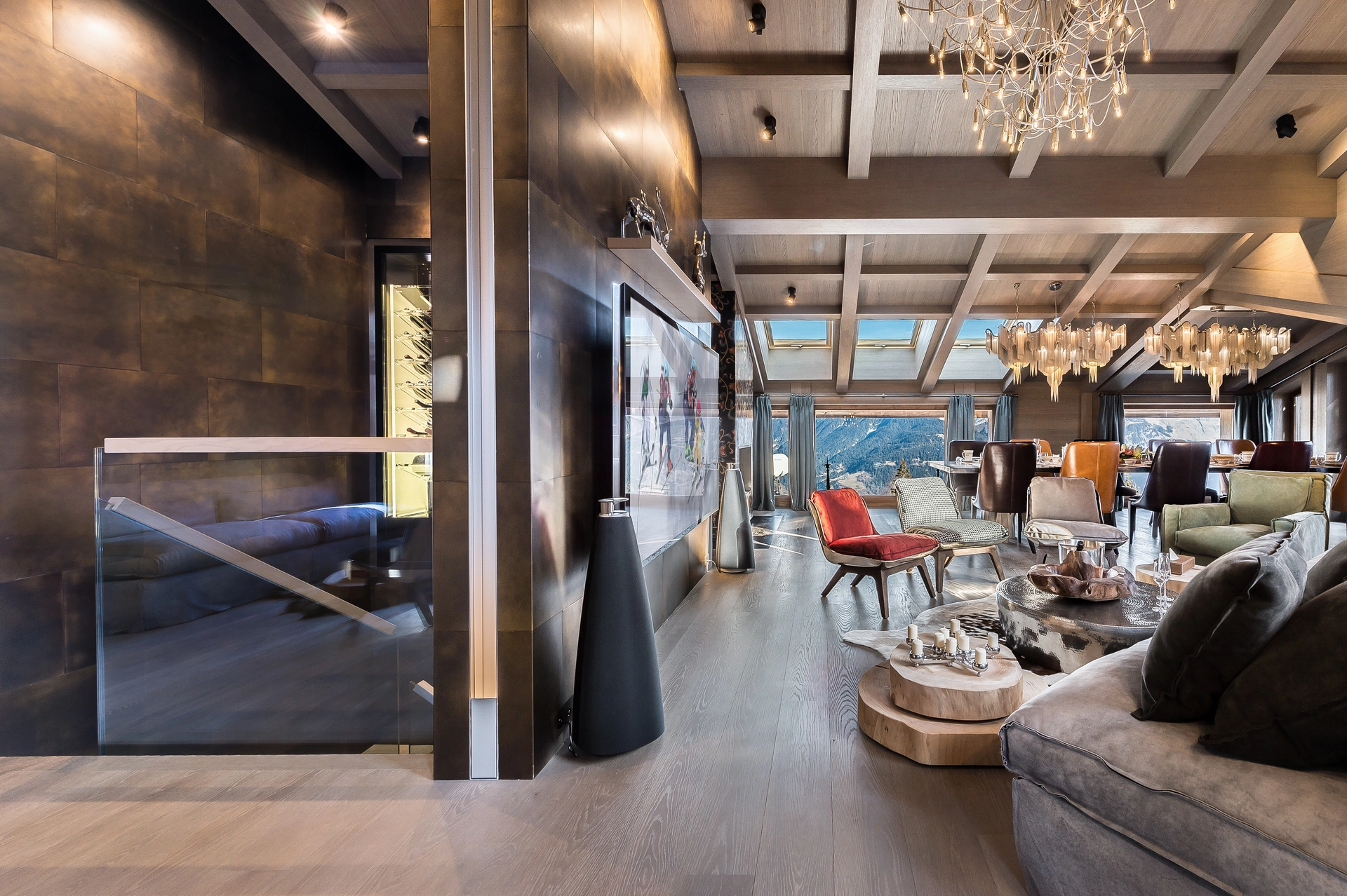 Great room with vaulted ceilings, wine cellar, and dining